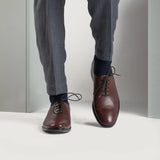 Tailored Rib Cuffs & Hem Craftsmanship Construction Detail on Director Wholecut Maroon Leather Shoes For Men