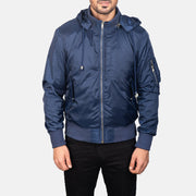 Close-Up Detail of Knit Rib with Removable Nylon Hood &amp; Zipper Hardware on Men's Blue Hooded Bomber Jacket