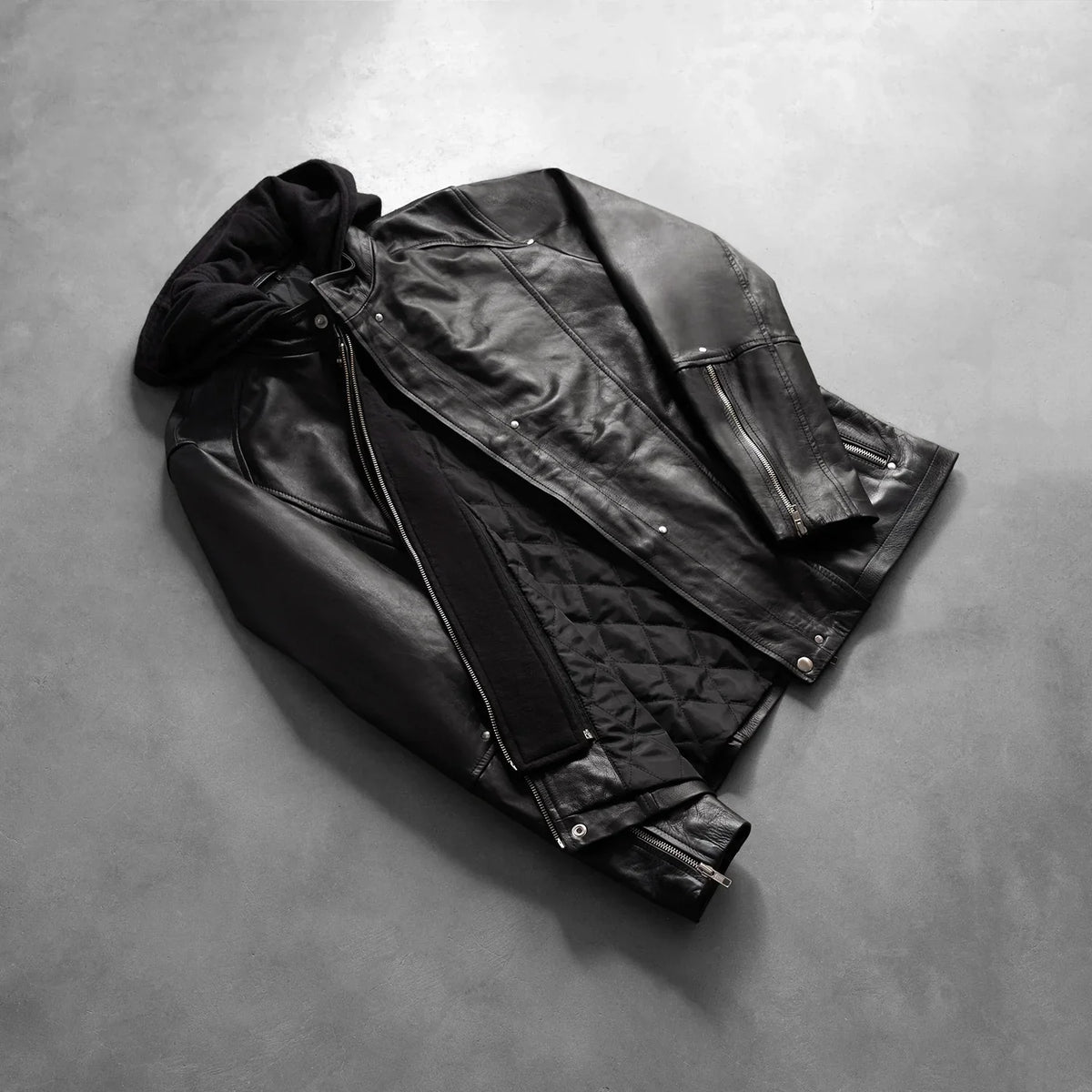Zipper &amp; Hem Craftsmanship Construction Detail on Men's Highschool Black Leather Jacket