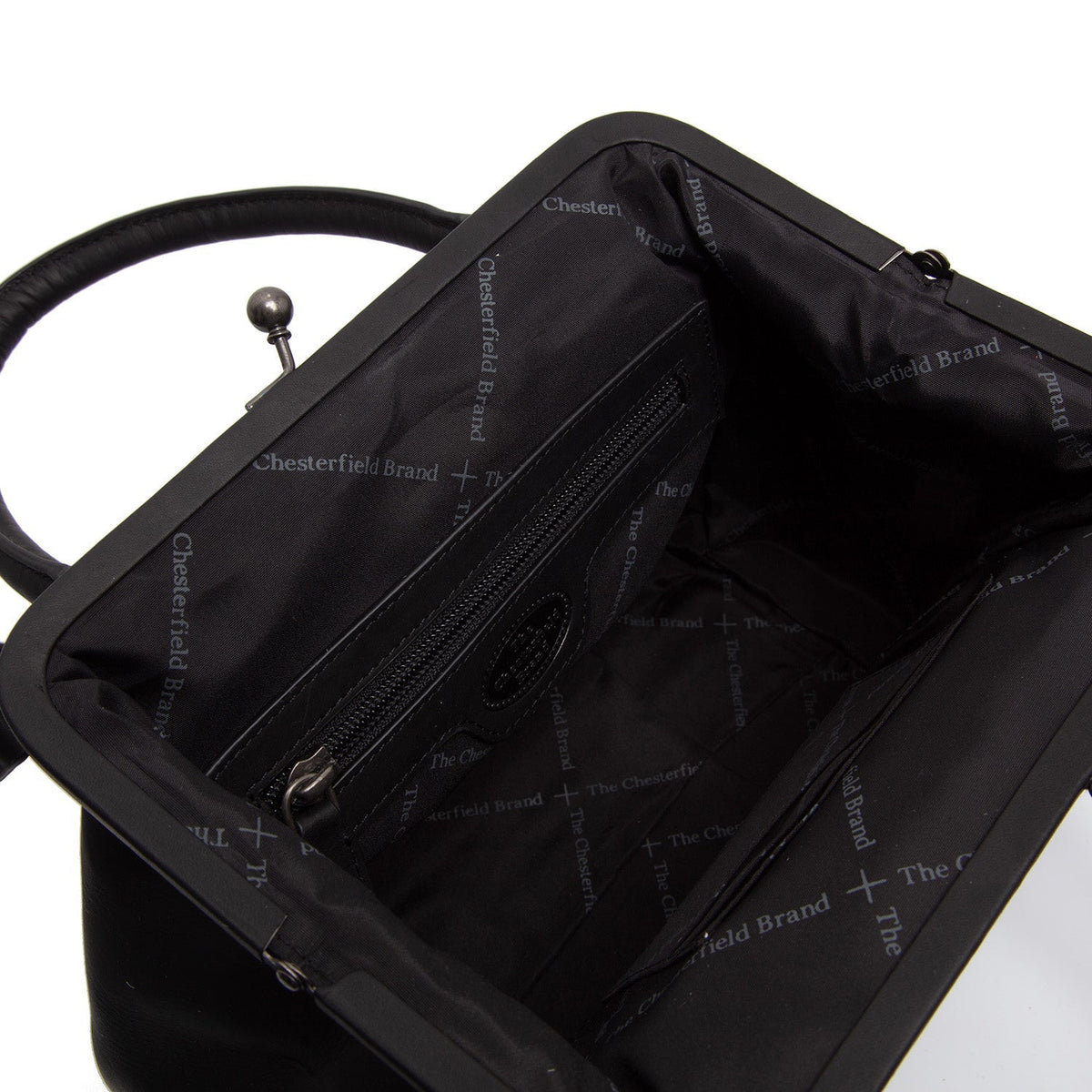 Close-Up Detail of Classic Collar &amp; Heavy-Duty Zipper Hardware on Chili Full-Grain Leather Handbag