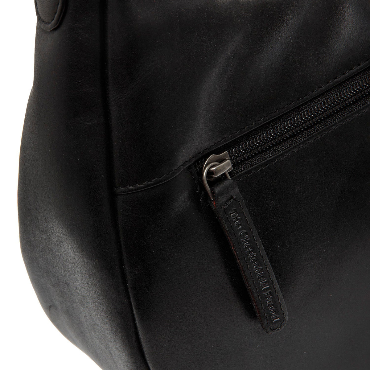 
100% Full-Grain Wax Pull-Up 100% Full-Grain Leather Grain Texture & Handcrafted Patina Detail