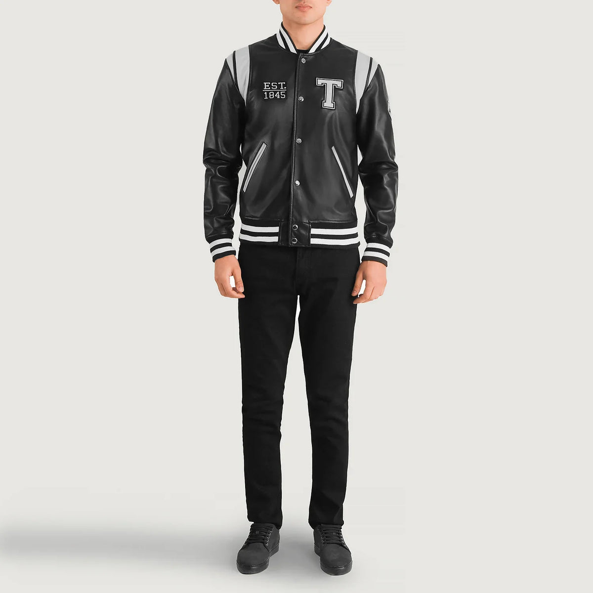 Liberte Texas Black Leather Varsity Jacket - Lateral Side Profile View Showing Sleeve Cut &amp; Athletic Taper Fit