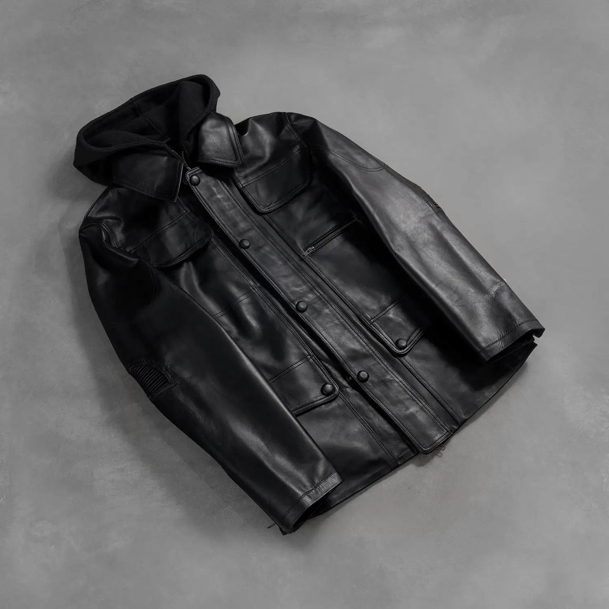 Zipper &amp; Hem Craftsmanship Construction Detail on Men's Moulder Hooded Black Leather Jacket