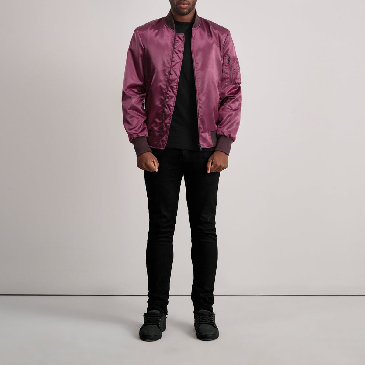 Close-Up Detail of Varsity &amp; Zipper Hardware on Quinton MA-1 Maroon Bomber Jacket