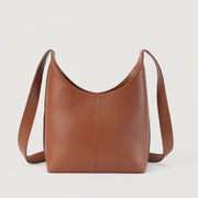 
Κοντινό πλάνο λεπτομέρειας of Classic Collar & Heavy-Duty Zipper Hardware on The Stefani Brown Leather Hobo Bag For Women